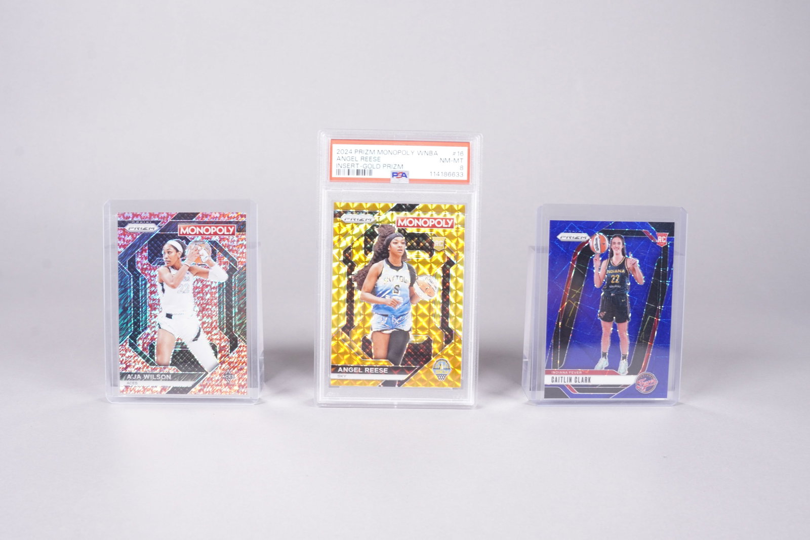 Caitlyn Clark WNBA cards: Lots WNBA basketball player cards, Angel Reese PSA graded, and Caitlyn Clark basketball card.