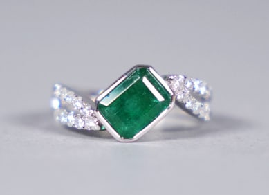 Platinum emerald diamond ring size 6.75.