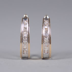 Pair 14 kt gold diamond earrings