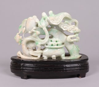Chinese jadeite carving with stand