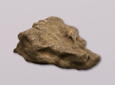 Heavy possibly meteorite boulder