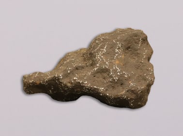 Heavy possibly meteorite boulder
