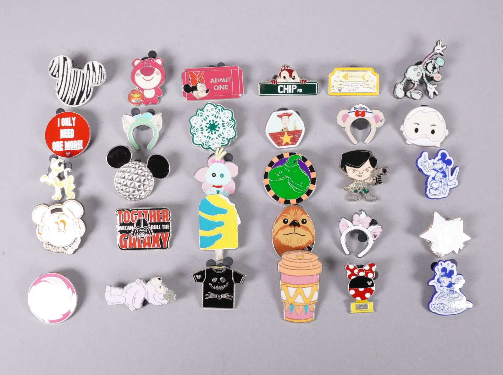 Lots Disney pins: Lots Disney pins.