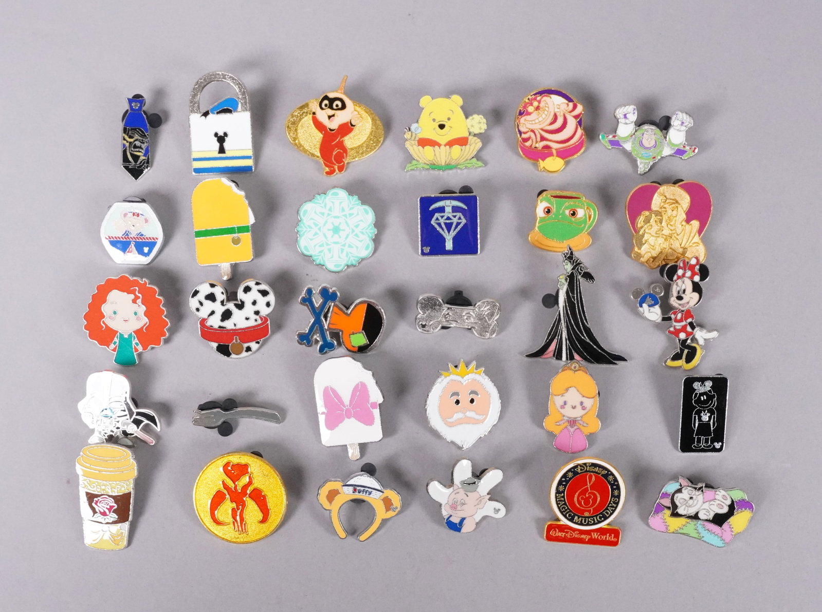 Lots Disney pins: Lots Disney pins.