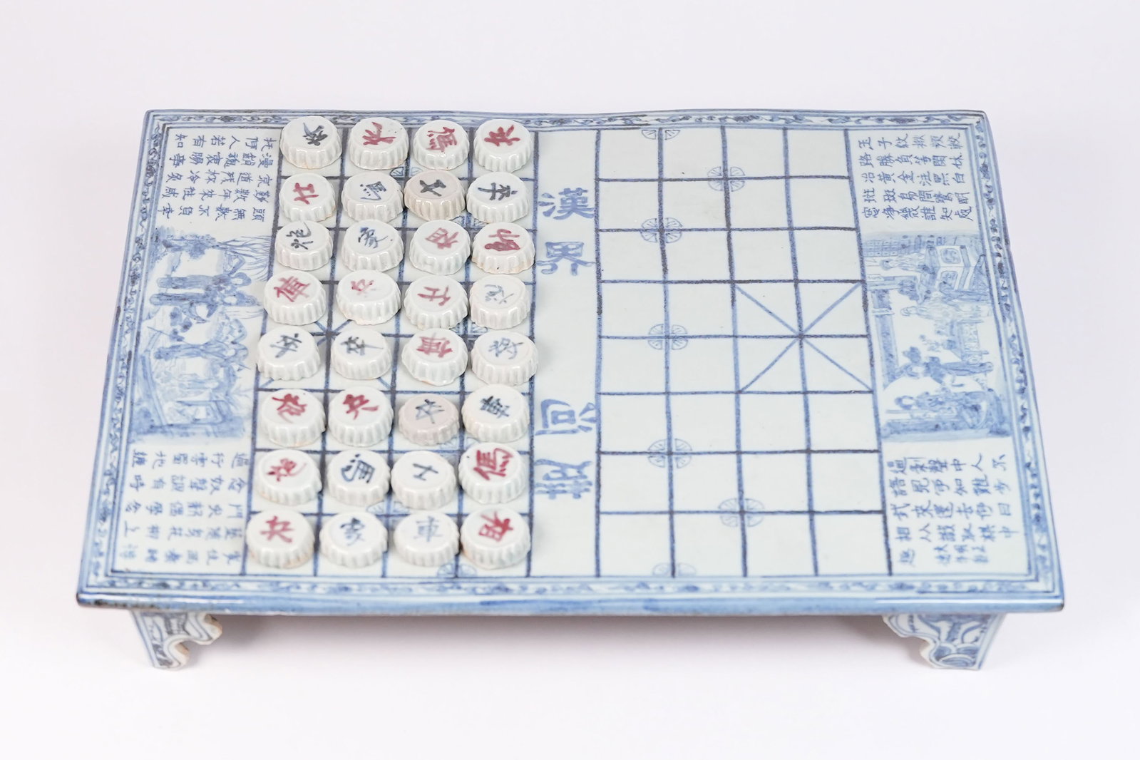 Chinese chess set: Chinese chess set, porcelains. H: 2.3" x W: 17."