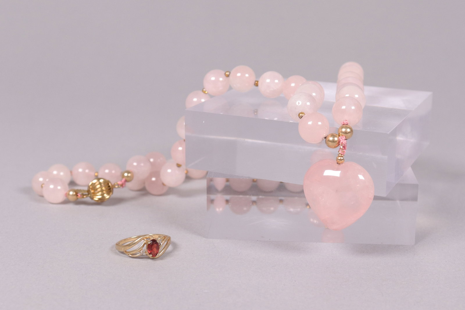 Lots estate jewelry: Lots estate jewelry, one is 14 kt gold rose quartz necklace.