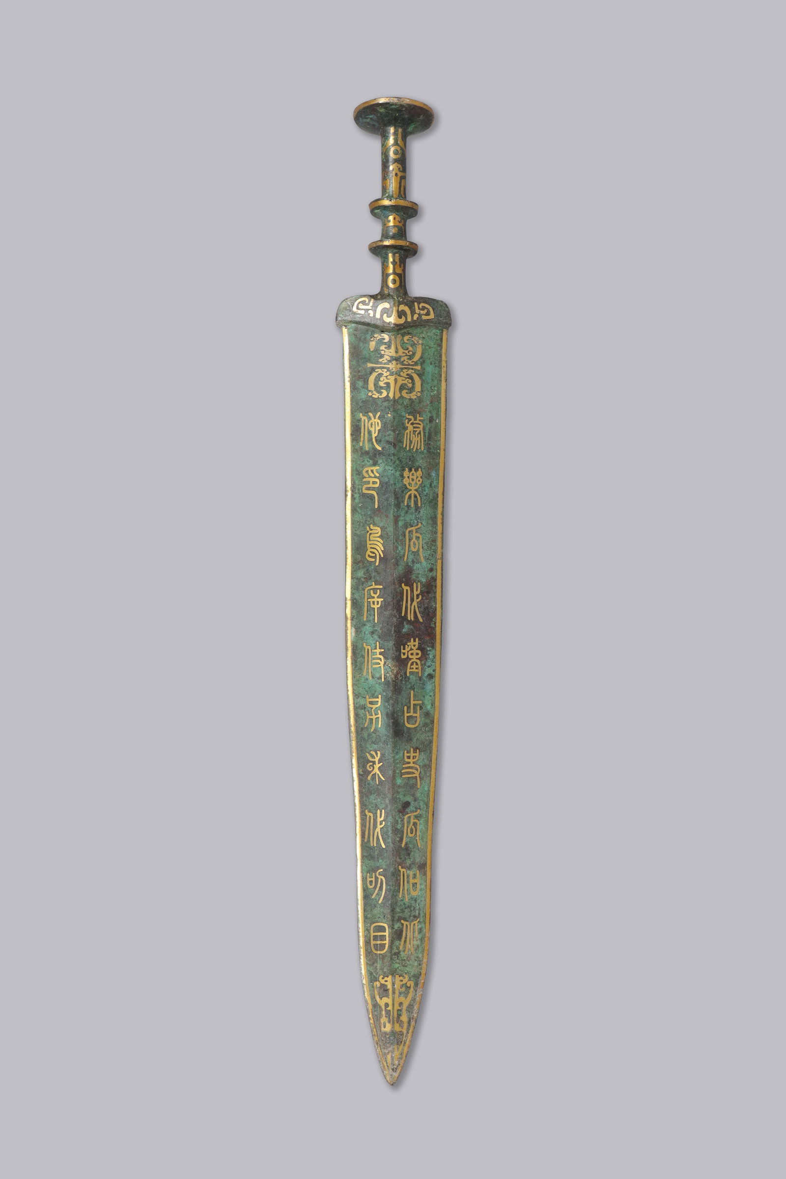 Chinese gilted bronze sword: Chinese gilted bronze sword. L: 19.75" x H: 2.5."