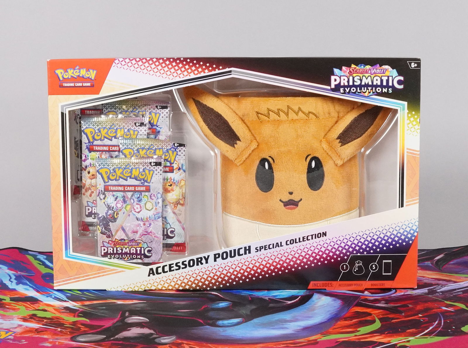 5 Pokemon Prismatic seald packs: 5 Pokemon Prismatic sealed packs, and a pouch.