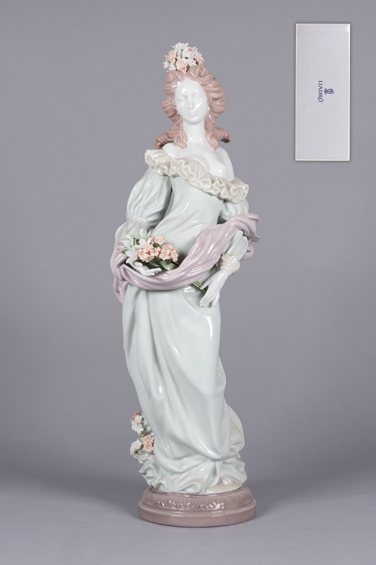 A tall Lladro figurine with box: A tall Lladro figurine with box. H: 16" x W: 4."