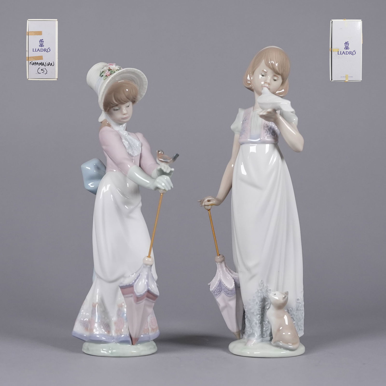 2 Lladro figurines with box: 2 Lladro figurines with box. Largest H: 9" x W: 2.3."