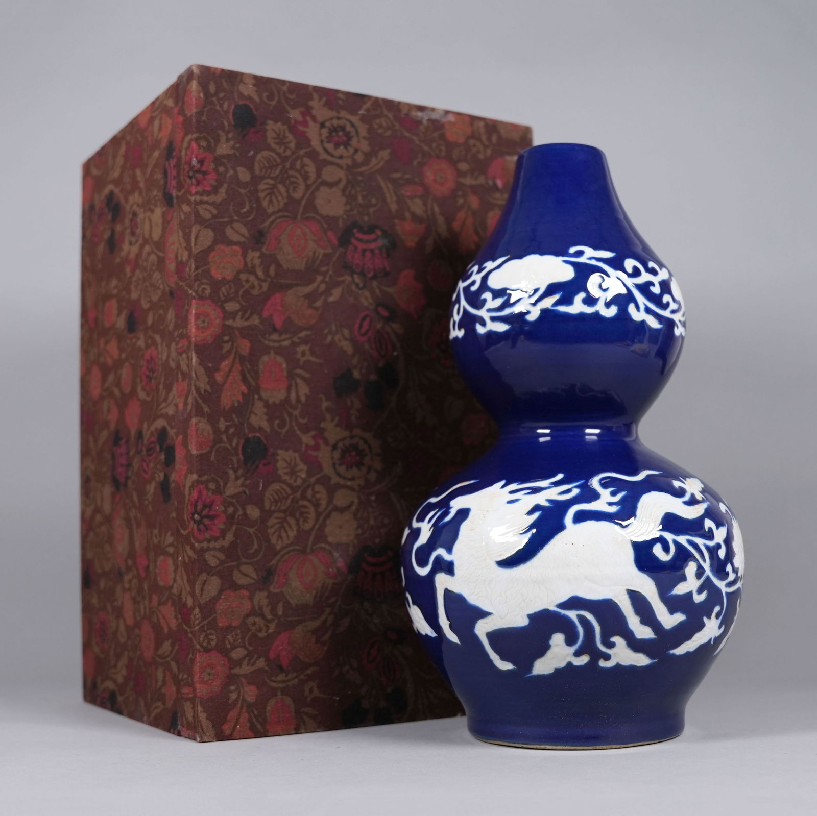 Chinese large gourd vase with box: Chinese large gourd vase with heavy silk box. H: 13.6" x W: 8."