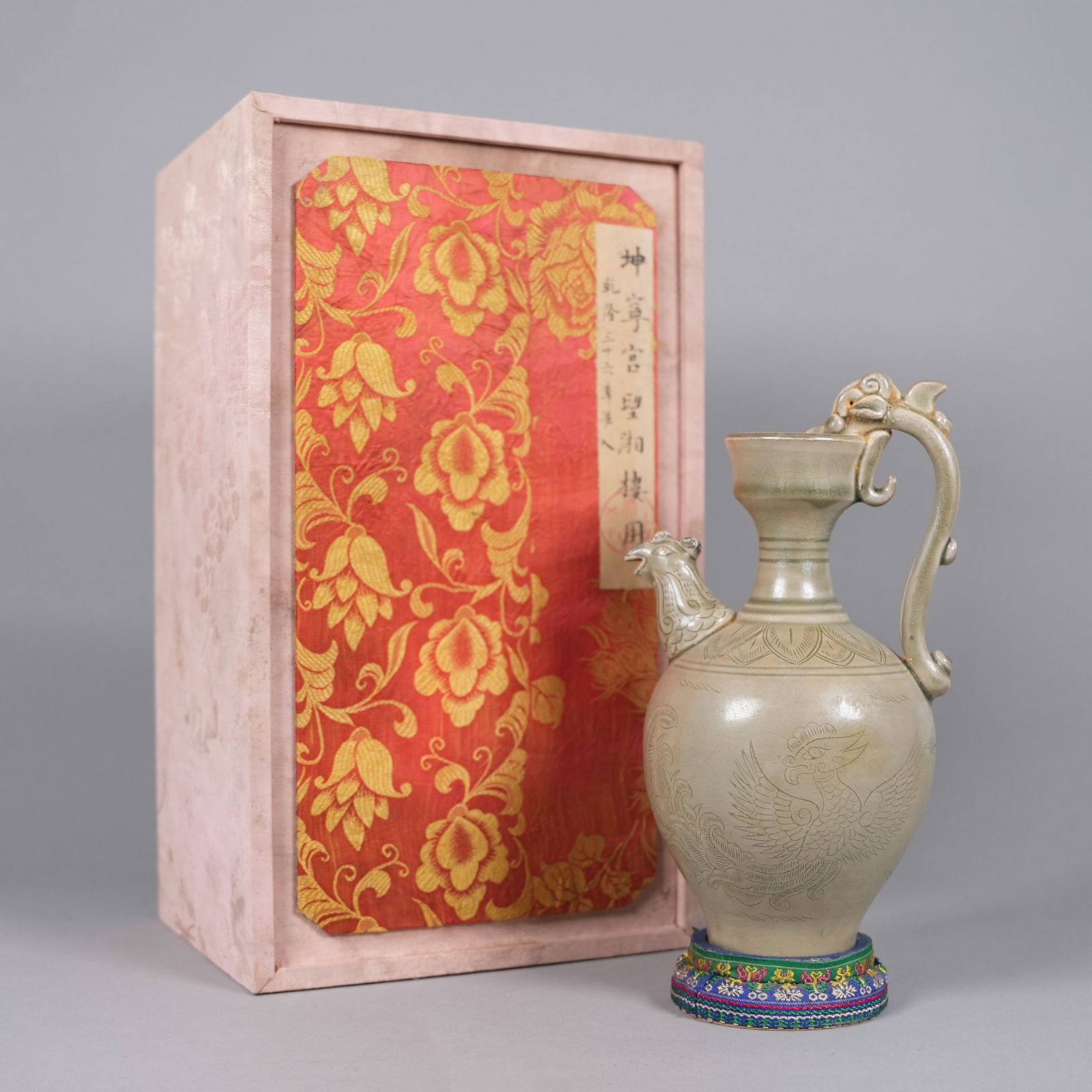 Chinese fine ceramic pot with box: Chinese fine ceramic pot with heavy silk box. H: 9.2" x W: 5.5."