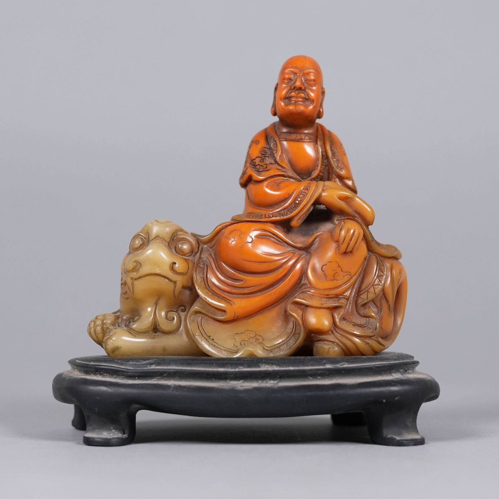 Chinese fine carved deity: Chinese fine carved deity with stand. H: 6" x W: 6."