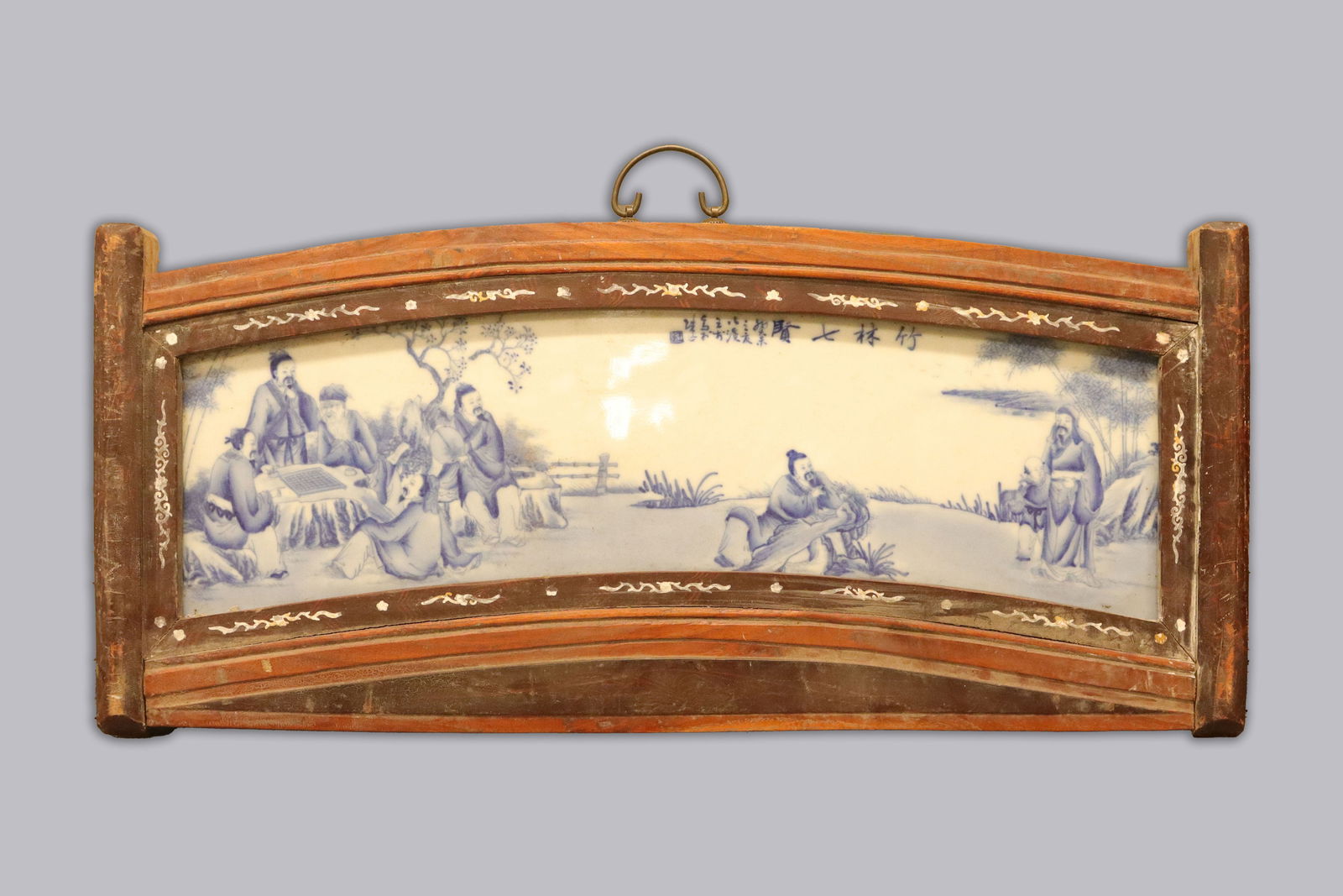 Chinese porcelain tile: Chinese wooden framed porcelain tile. H: 12.6" x W: 29.6."