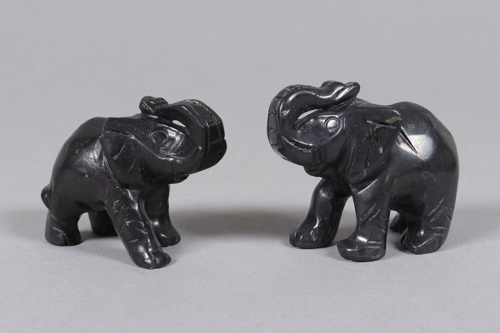2 Asian carved tournamaline elephants: 2 Asian carved tourmaline elephants.