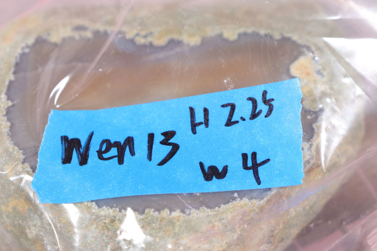 A large carved boulder - 6