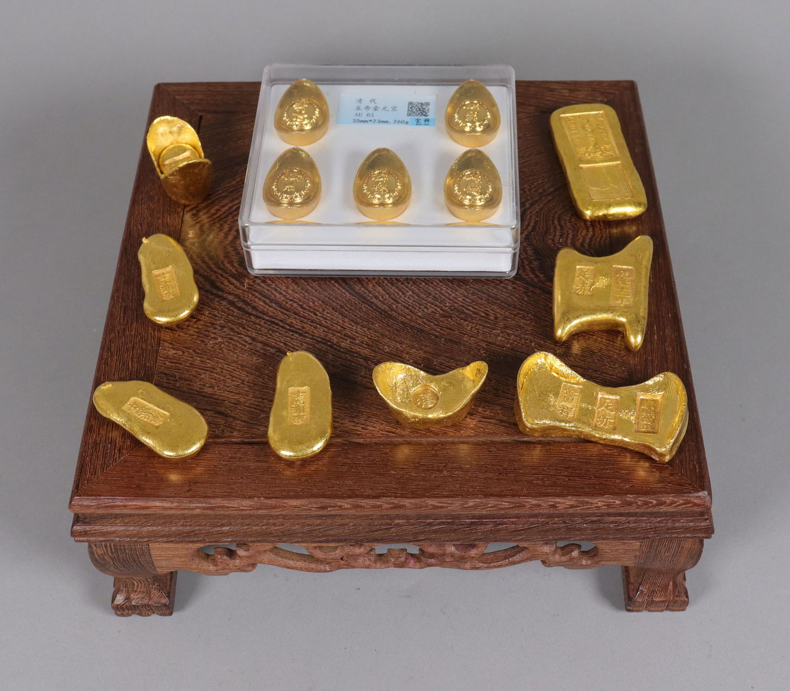 Lots Chinese ingots ungraded: Lots Chinese carved ingots, ungraded. We do not guarnatee carvings, markings, material, age, or carvings on the item itself. Possibly fake, copy or reproduction. Condition selling it as is.