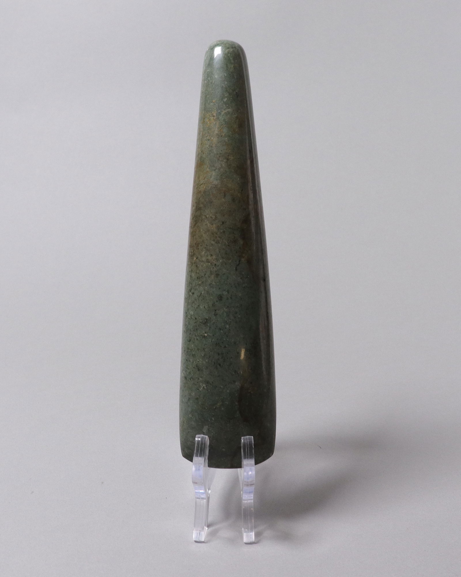 Important Pre-Columbian green jade celt: Important Pre-Columbian fine green jade celt. From a major estate. H: 9" x W: 2."