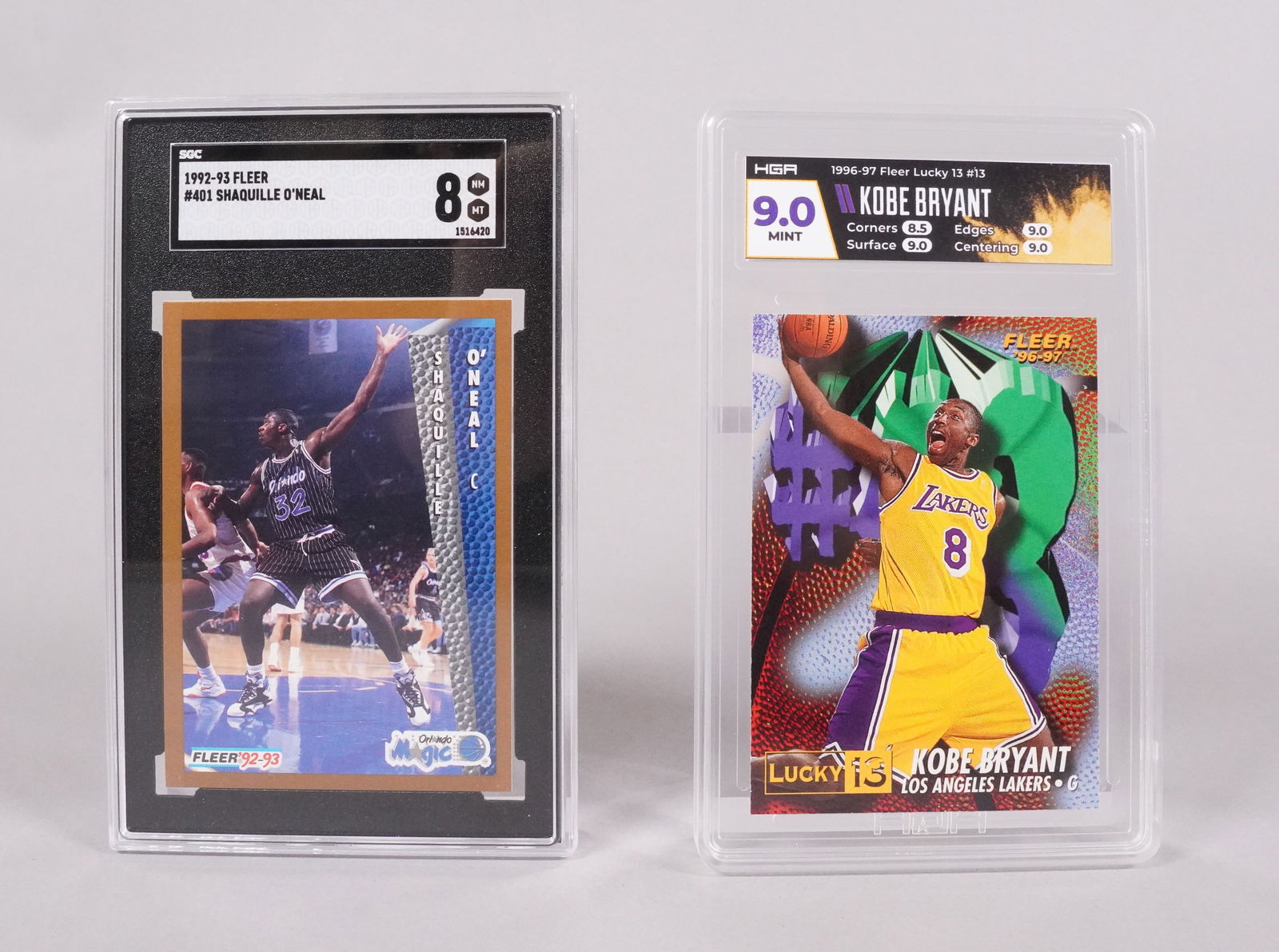 Shaq and Kobe Bryant basketball cards: Shaq SGC 8, and Kobe Bryant basketball cards.