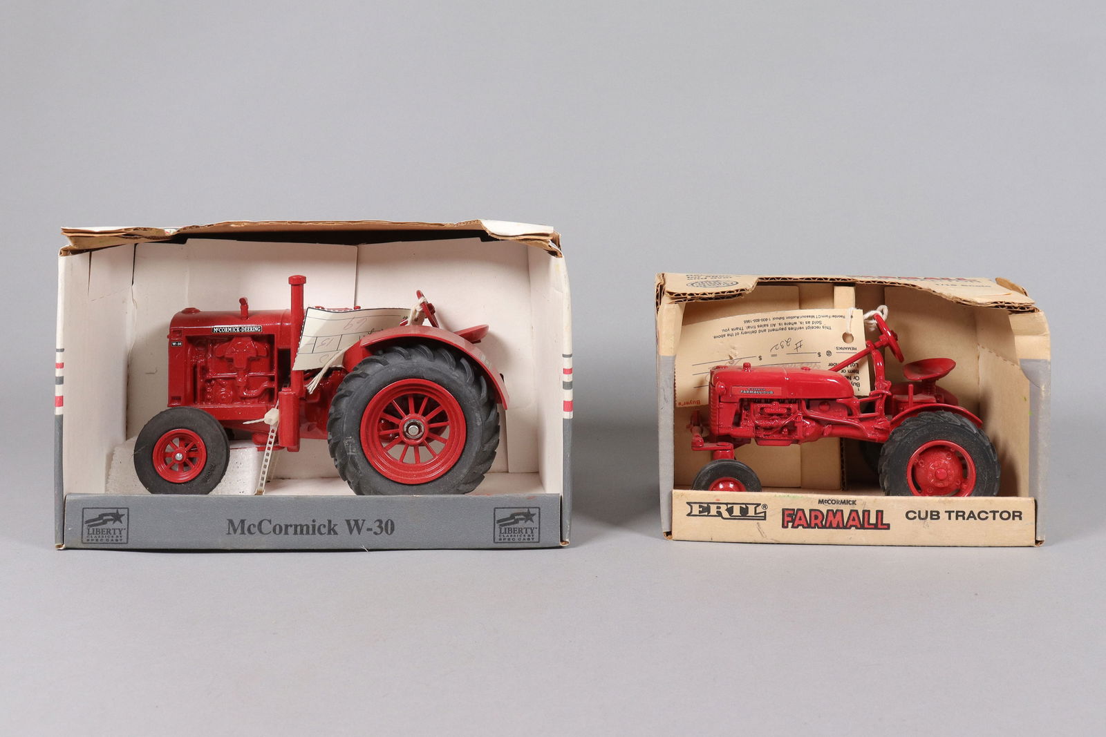 Lots metal tractor toy: Lots metal tractor toy.