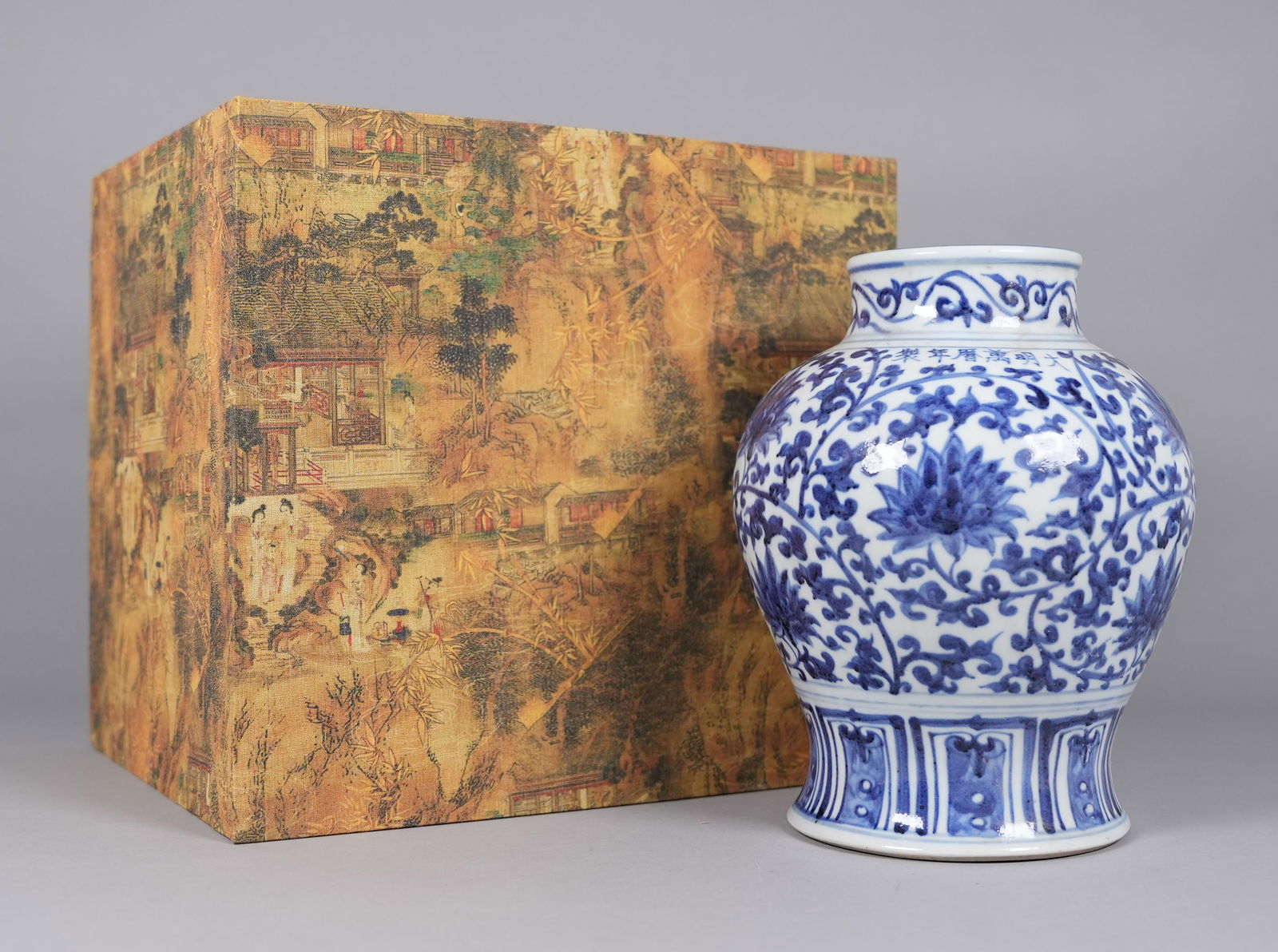 Chinese fine b/w jar with silk box: Chinese fine blue and white jar with silk box. H: 9.2" x W: 7.1."