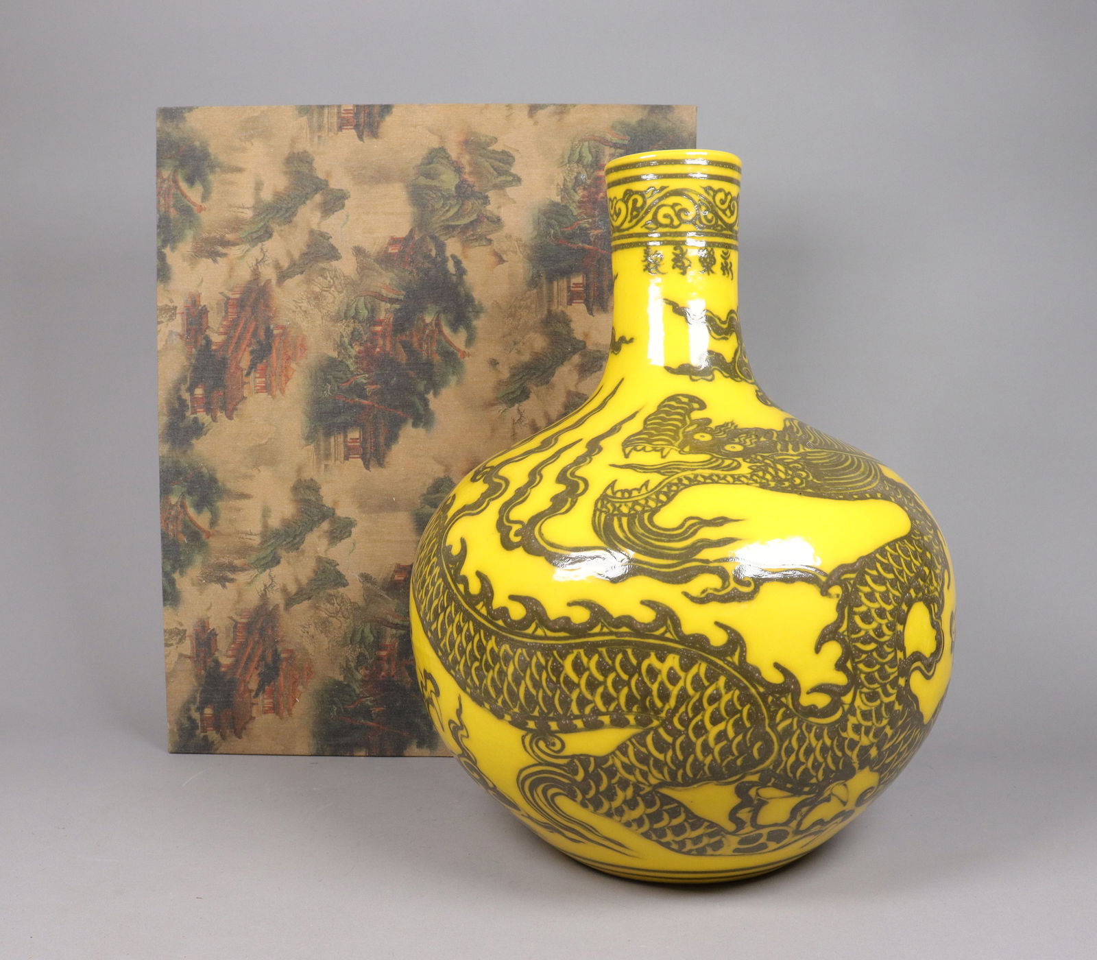 Chinese massive dragon vase with box: Chinese massive dragon vase with heavy silk box. H: 17" x W: 12.5."