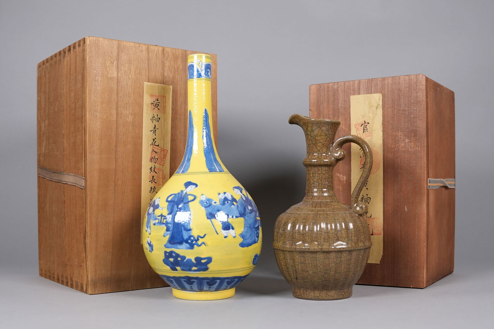 2 Chinese fine porcelains with box: 2 Chinese fine porcelains with wooden box. Largest H: 12" x W: 6."