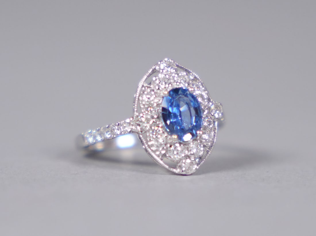 Platinum natural sapphire diamond ring GIA: Platinum natural oval cut sapphire diamond ring. Comes with GIA certificate. Total 1.09 carat sapphire, and 0.50 carats diamonds.