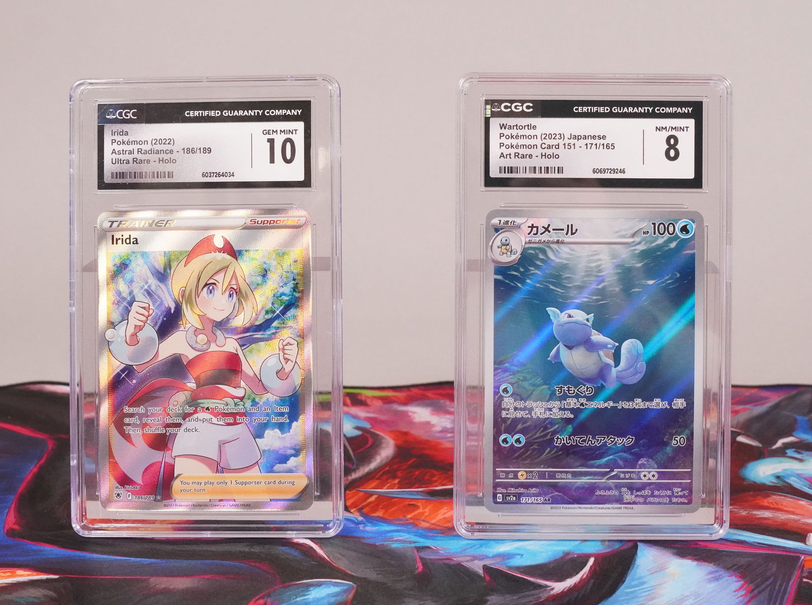 2 Pokemon cards CGC graded: 2 Pokemon cards, CGC graded.