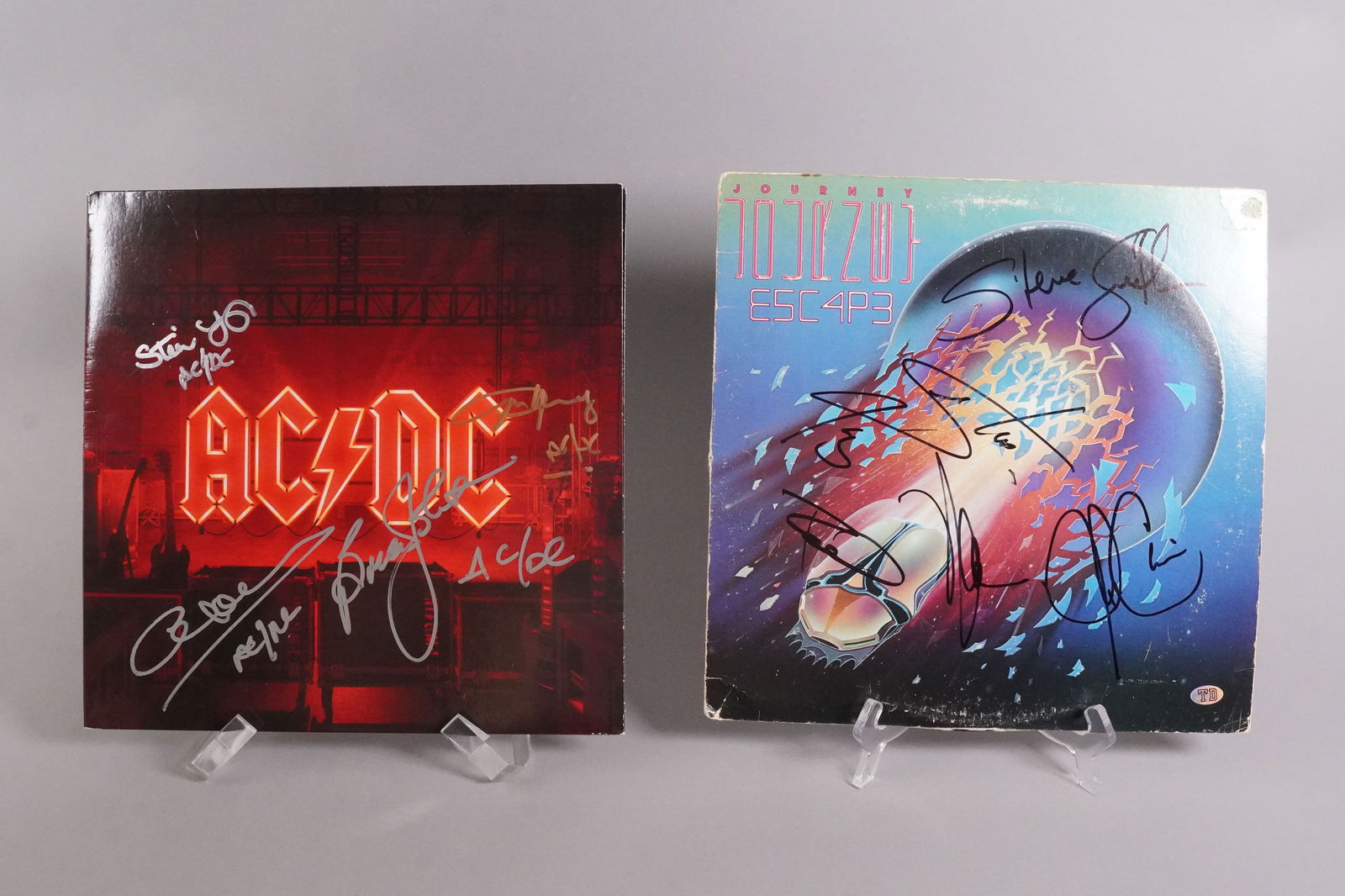 Journey signed ACDC signed vinyl: Journey, original members signed vinyl and ACDC signed vinyl. From an estate.