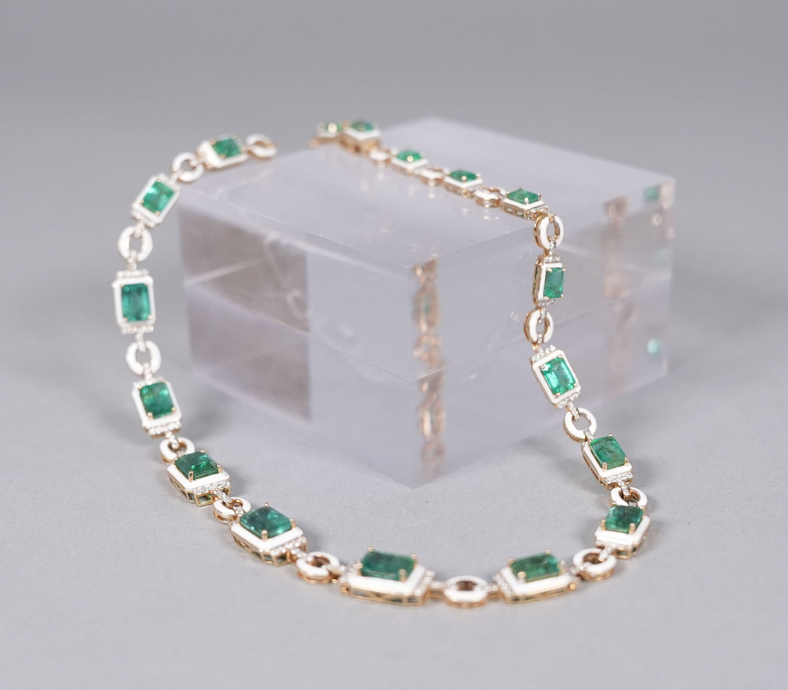 14 kt y/g emerald diamond bracelet: 14 kt yellow gold natural beryl emerald diamond bracelet. Total 24.96 carats emerald and total 2.06 carats diamond.