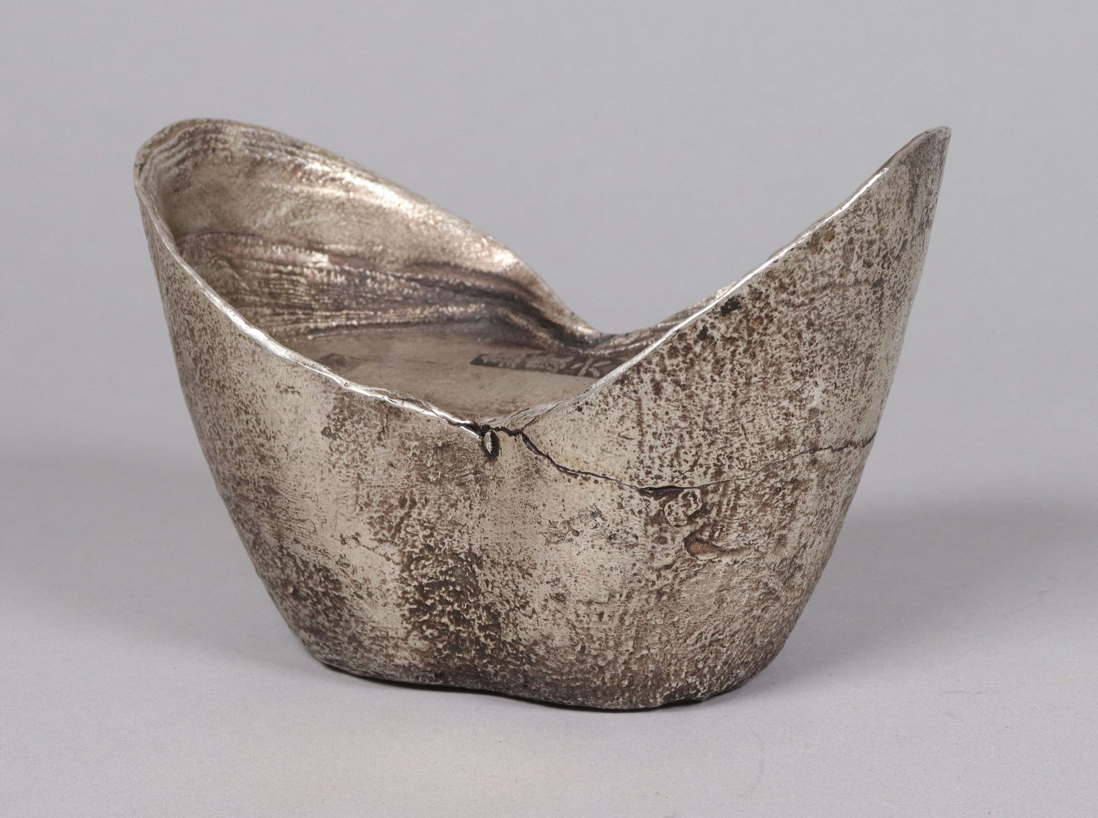 A large Chinese ingot ungraded: A large Chinese heavy ingot. We do not guarantee any material, age, engraving, carvings. All sales are final, no return.