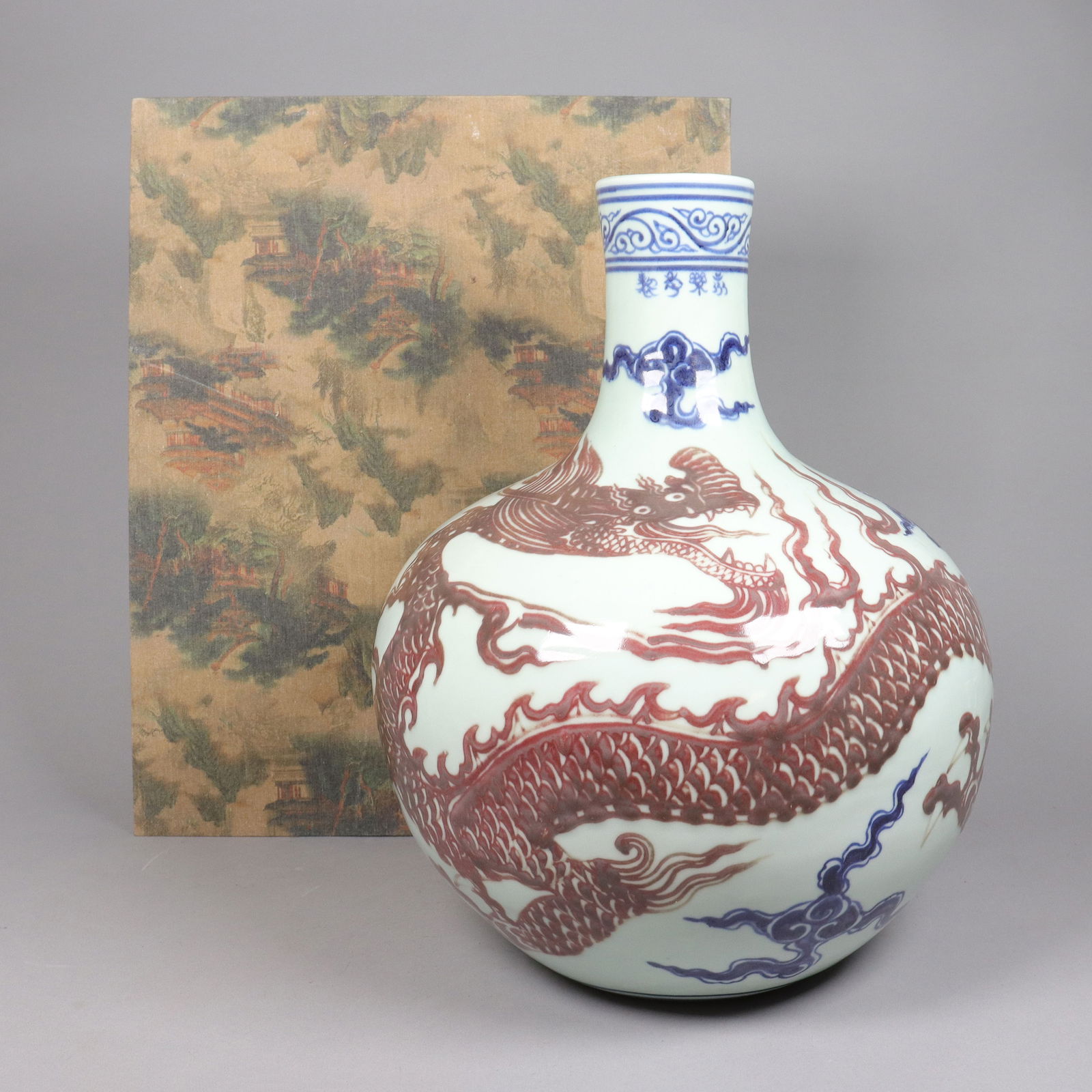 Chinese large blue red dragon vase with box: Chinese large blue red dragon vase with heavy silk box. H: 16.5" x W: 12."
