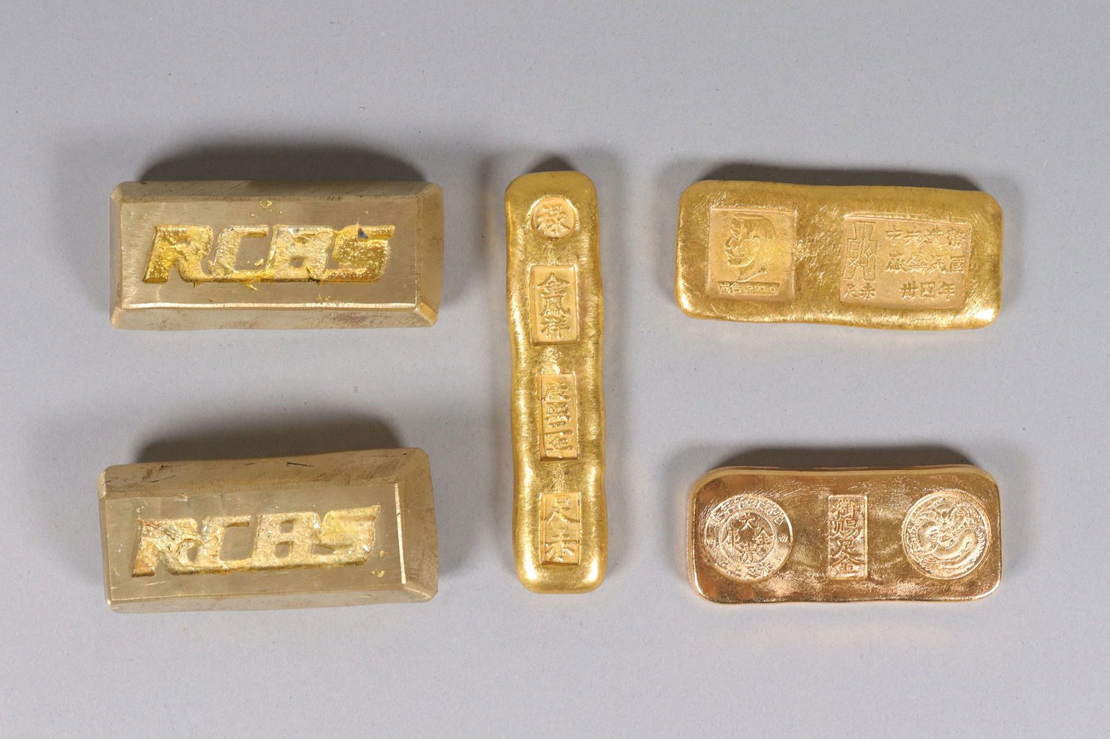 Lots ingots ungraded: Lots ingots ungraded. Did not get authenticate. We do not guarantee any engravings, carvings, material, or age. All sales are final, no return.