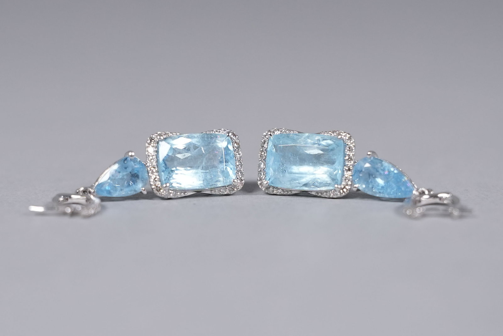 Pair rare platinum natural aquamarine and diamond earrings. Total 12.91 carats natural aquamarine,: Pair rare platinum natural aquamarine and diamond earrings. Total 12.91 carats natural aquamarine, and total 0.64 carats diamond.