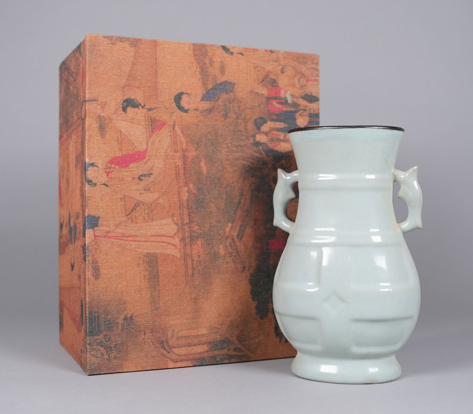 Chinese celadon vase with heavy silk box. H: 8.9" x W: 5.5.": Chinese celadon vase with heavy silk box. H: 8.9" x W: 5.5."