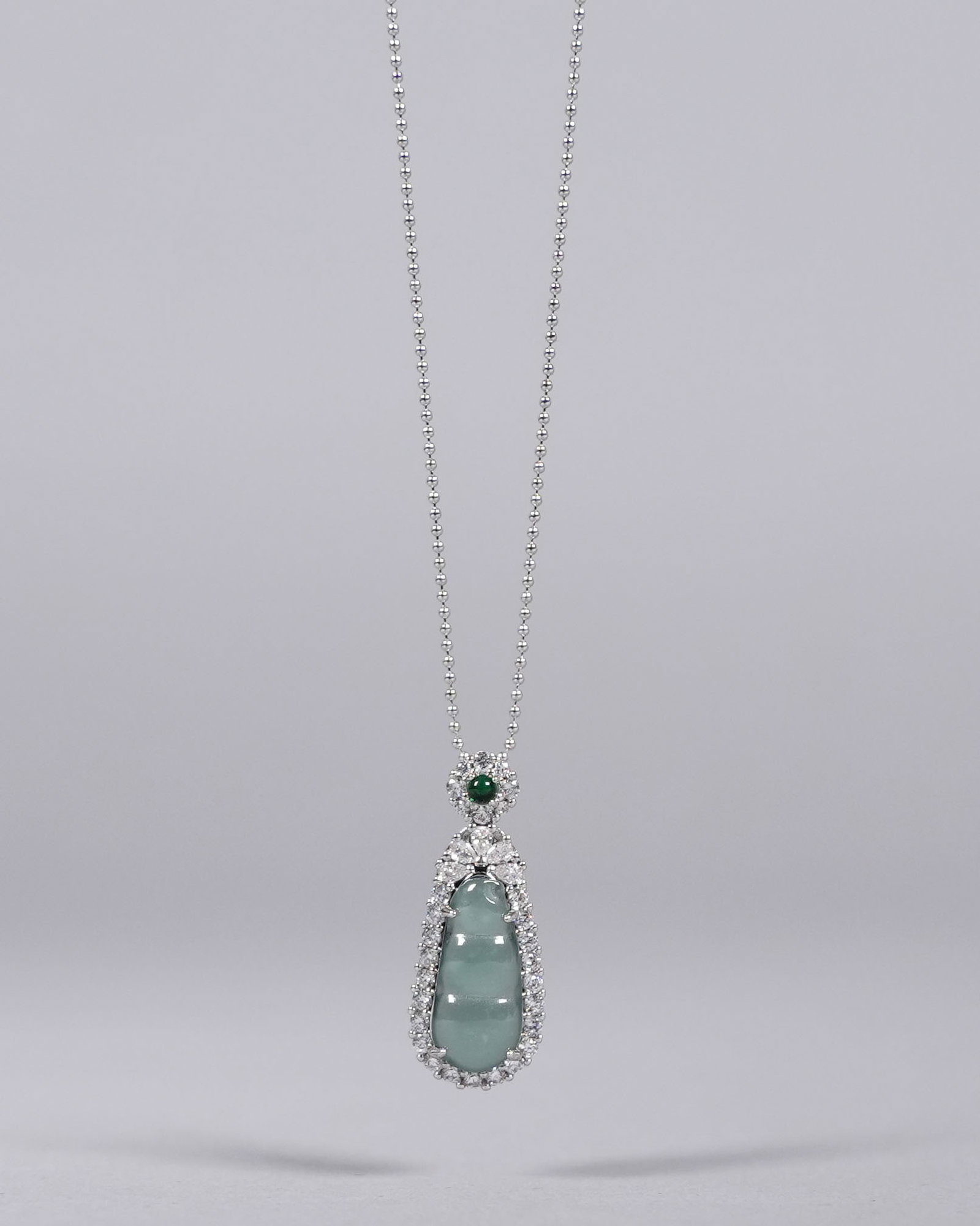 A fine sterling natural jadeite carved necklace. (1 of 7)