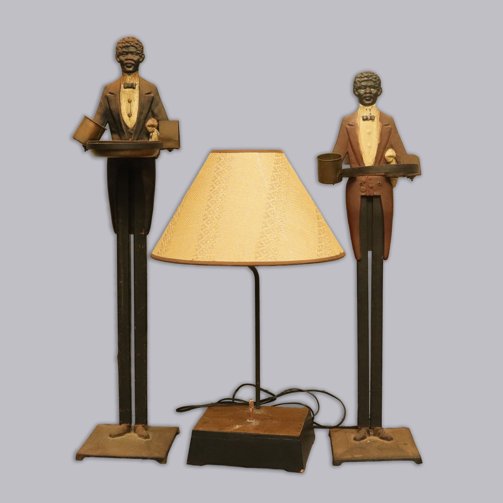 2 Black Americana metal stand and lamp: 2 Black Americana metal stand with tray and a vintage lamp. All sales are final, condition selling it as is. Tallest H: 36" x W: 8."