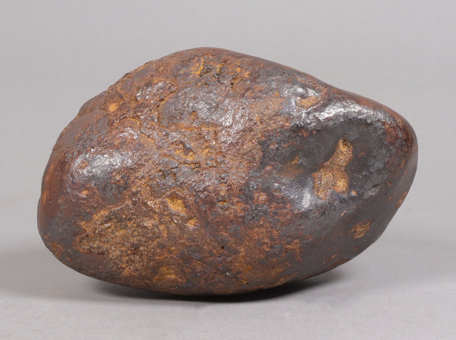 A large carved boulder: A large carved boulder, possibly meteorite boulder. Condition selling it as is, all sales are final. Total weight 13.2 lb.