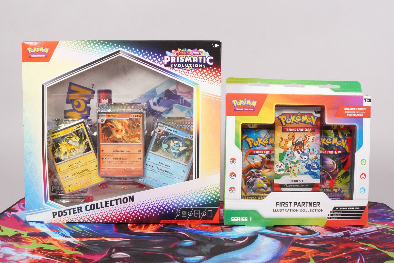 Pokemon Prismatic and First Partner sealed packs: Lots Pokmeon Prismatic sealed packs and Pokemon First Partner sealed packs.