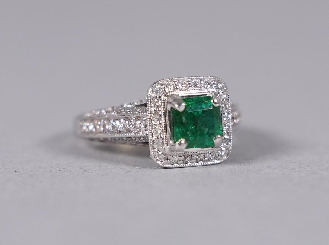 14 kt w/g natural emerald diamond ring: 14 kt white gold natural emerald beryl diamond ring. Total 1.05 carats natural emerald and total 0.80 carats natural diamond. Appraisal report $11,520. US ring size 7.