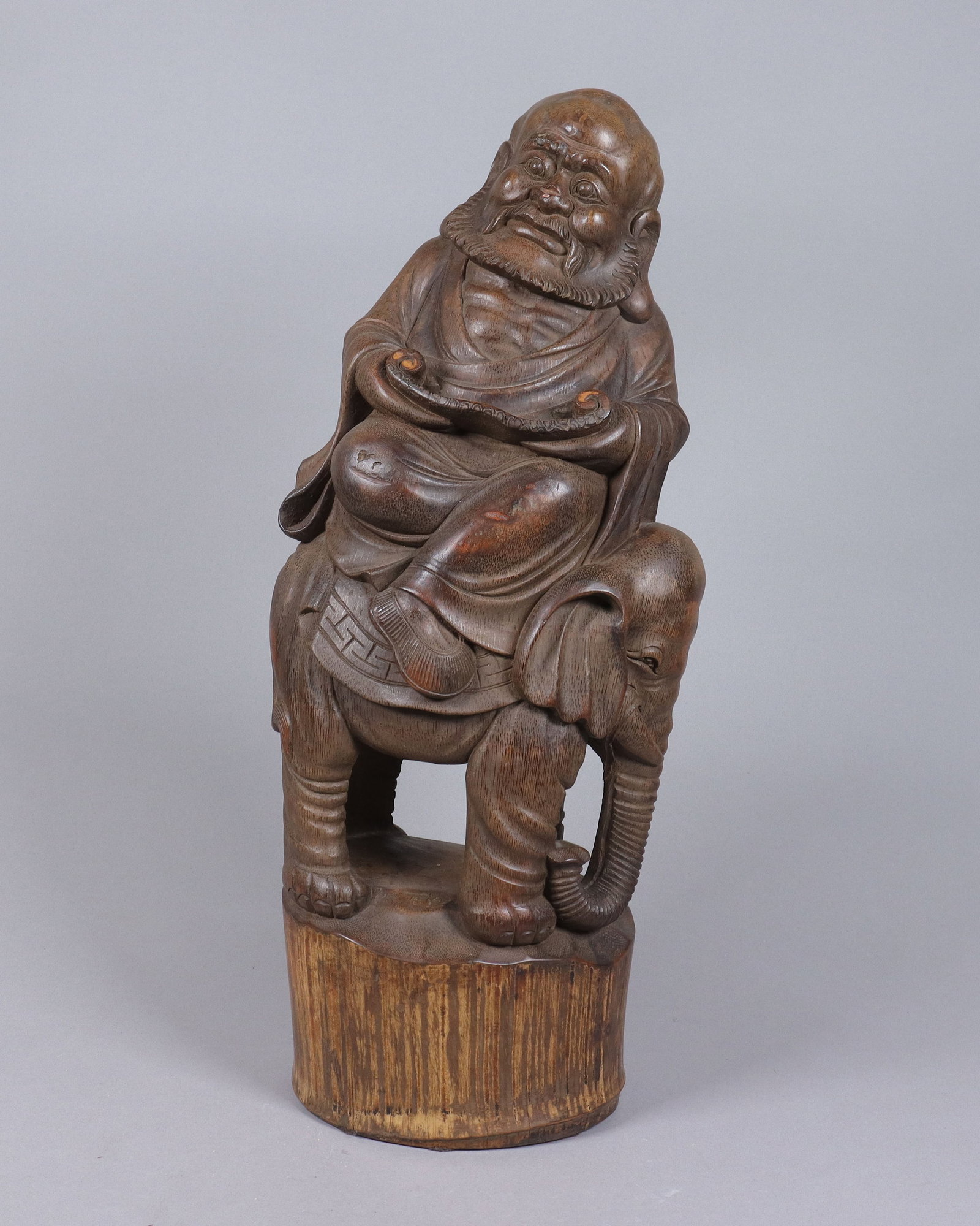 A Chinese fine bamboo carved buddha: A Chinese fine bamboo carved buddha. H: 19.75" x W: 8.25."