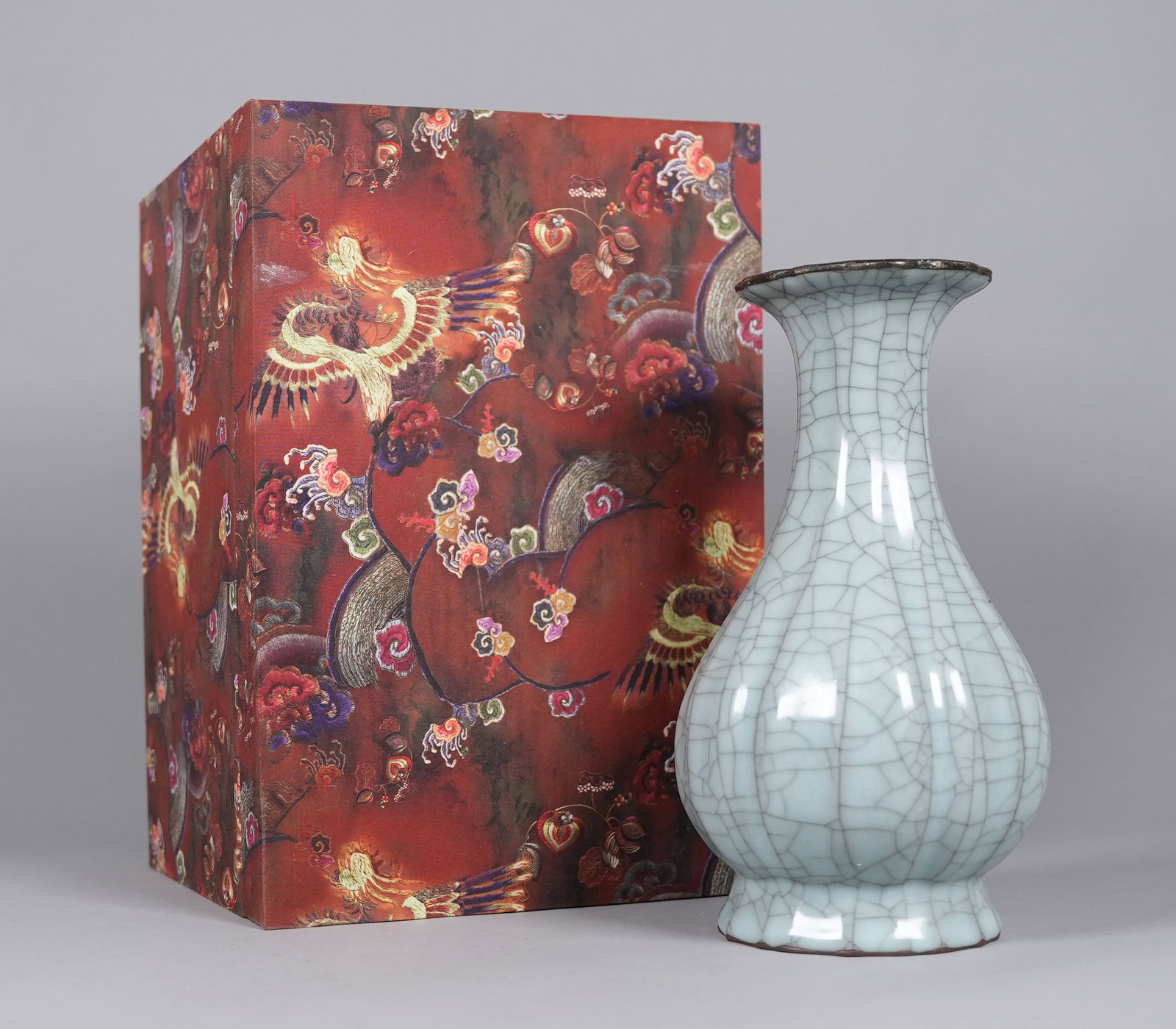 Chinese fine celadon vase with heavy box: Chinese fine celadon vase, with markings on bottom. Comes from fitted heavy silk box. H: 9.7" x W: 5.5."