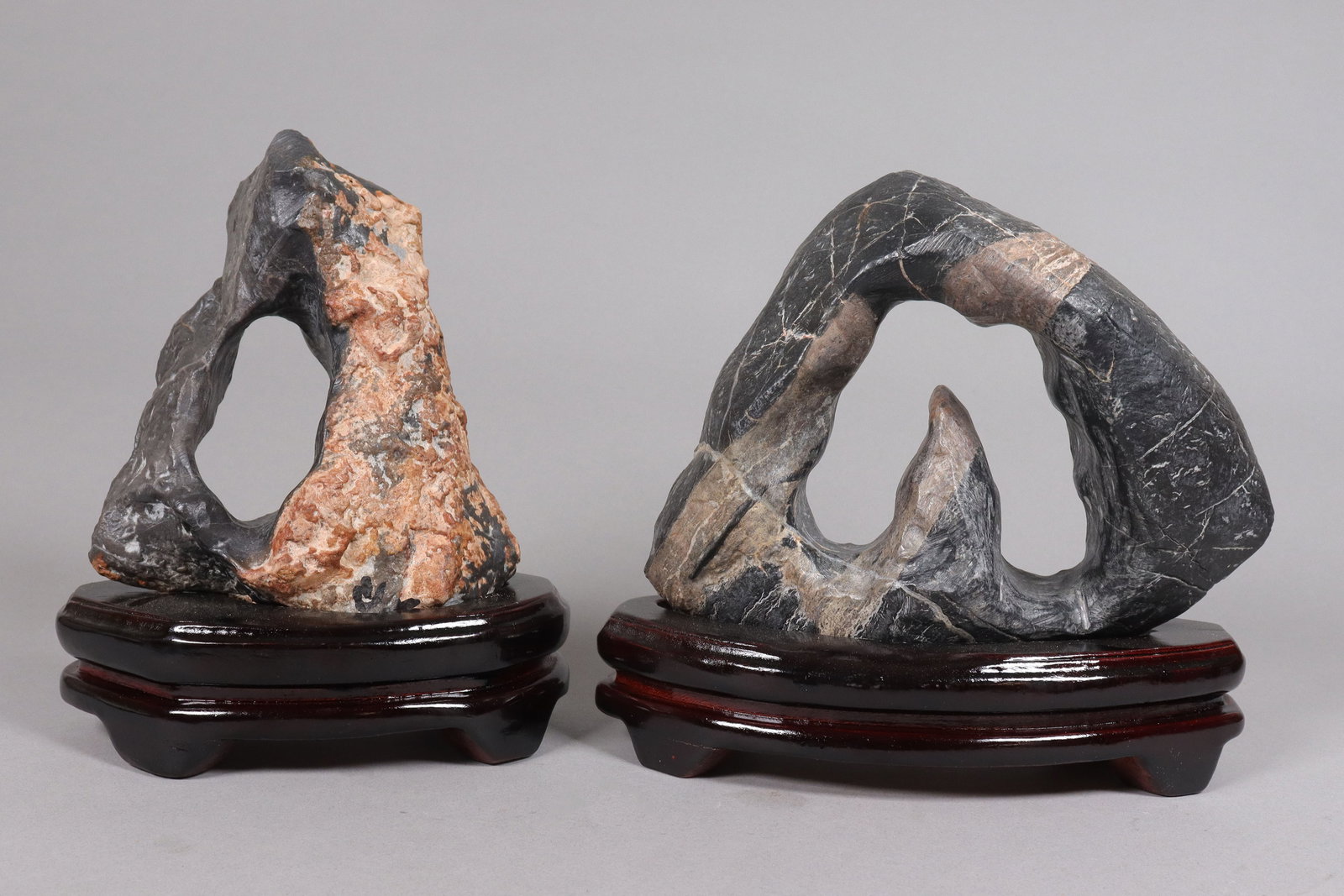 2 Chinese scholar rock with stand: 2 Chinese scholar rock with wooden stands. Condition selling it as is.