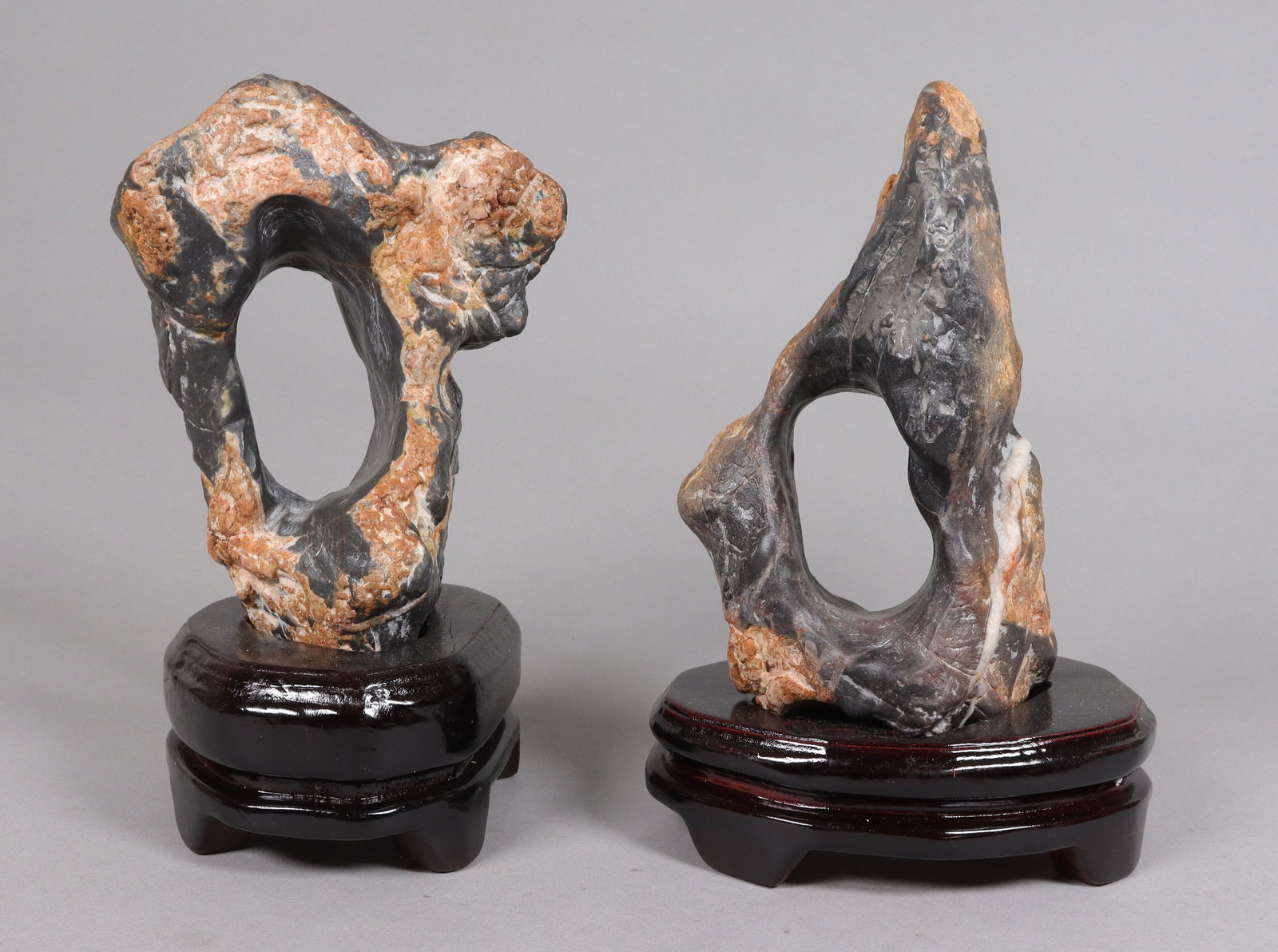 2 Chinese scholar rock with stand: 2 Chinese scholar rock with wooden stands. Condition selling it as is.