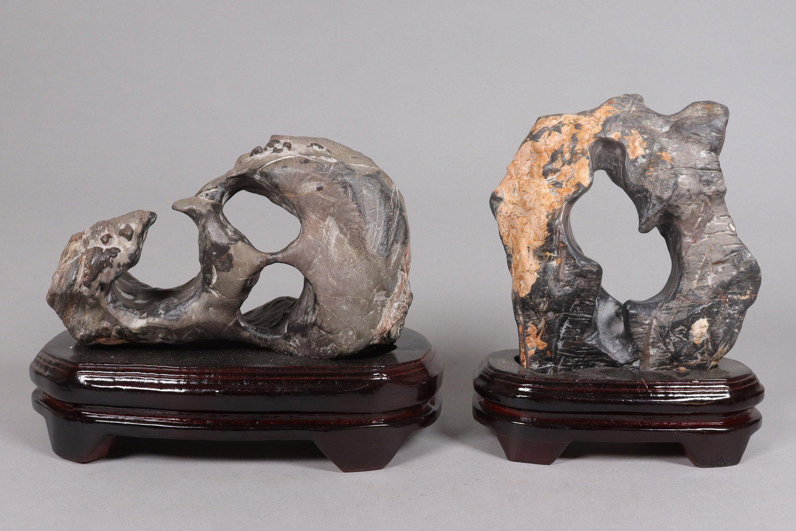 2 Chinese scholar rock with stand: 2 Chinese scholar rock with wooden stands. Condition selling it as is.