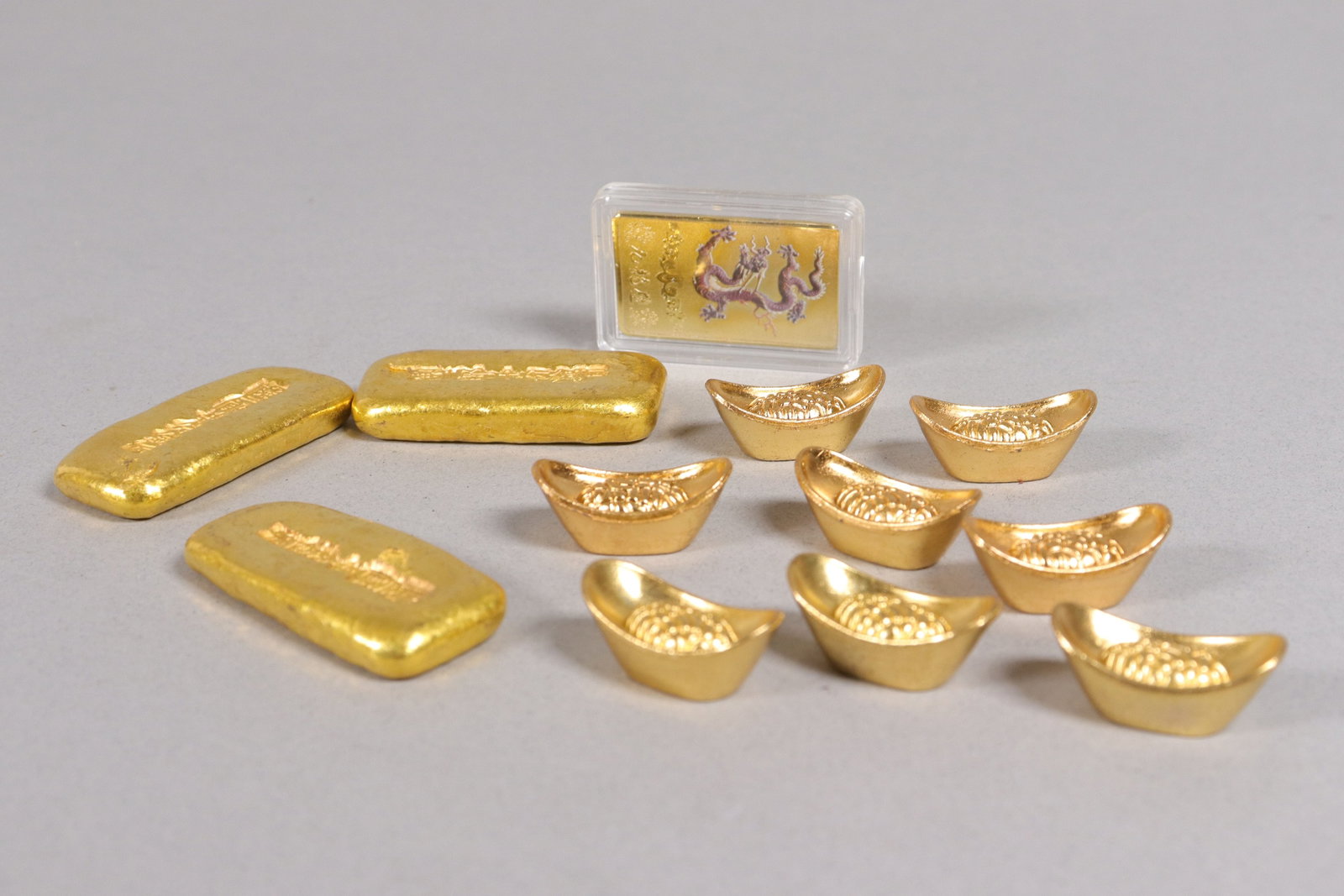 Lots Chinese ingots ungraded: Lots Chinese ingots ungraded. We do not guarantee its age, material, engraving, carvings or any type of grading. All sales are final, condition selling it as is. No return.
