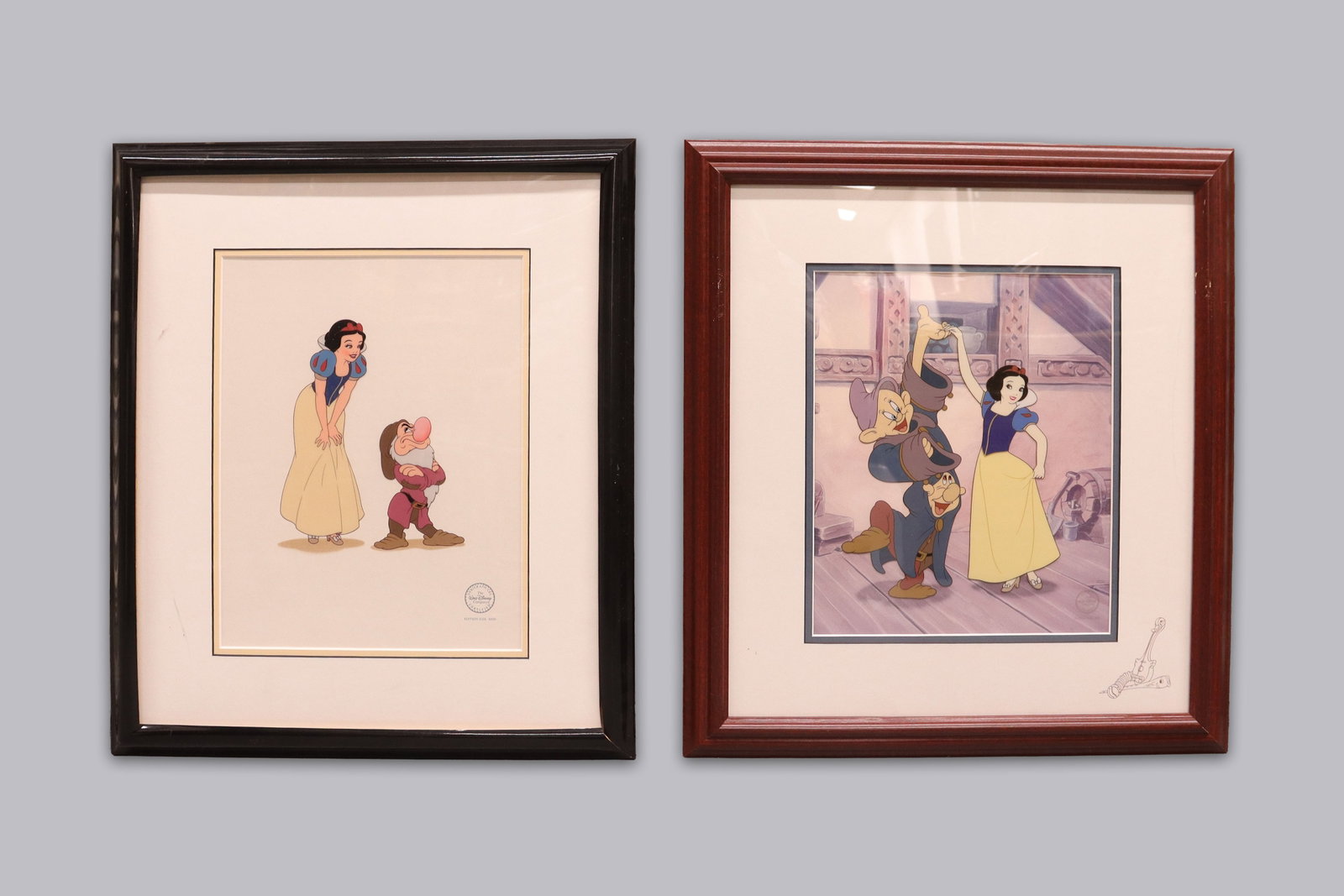 2 Disney Snow White framed art COA: 2 Disney Snow White framed art, comes with certificate of authenticity. Largest H: 22" x W: 18."