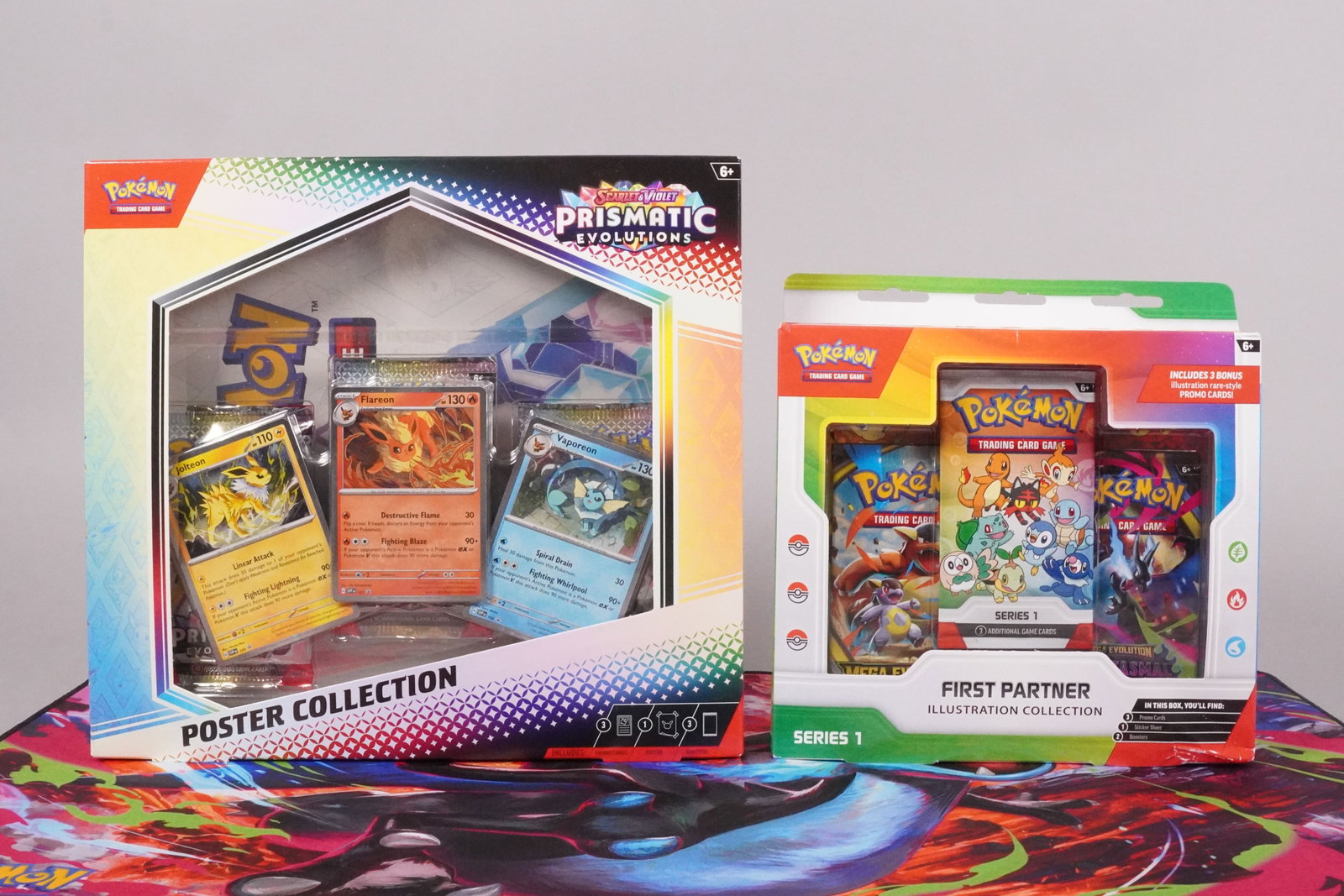 Lots sealed Pokemon packs Prismatic: Lots sealed Pokemon Prismatic and First Partner sealed packs, limited edition.