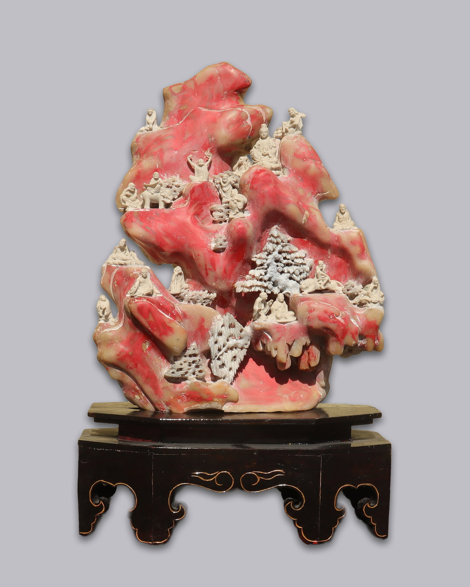 Chinese heavy carved boulder with stand: Chinese heavy fine carved boulder with wooden stand. H: 25.25" x W: 21."